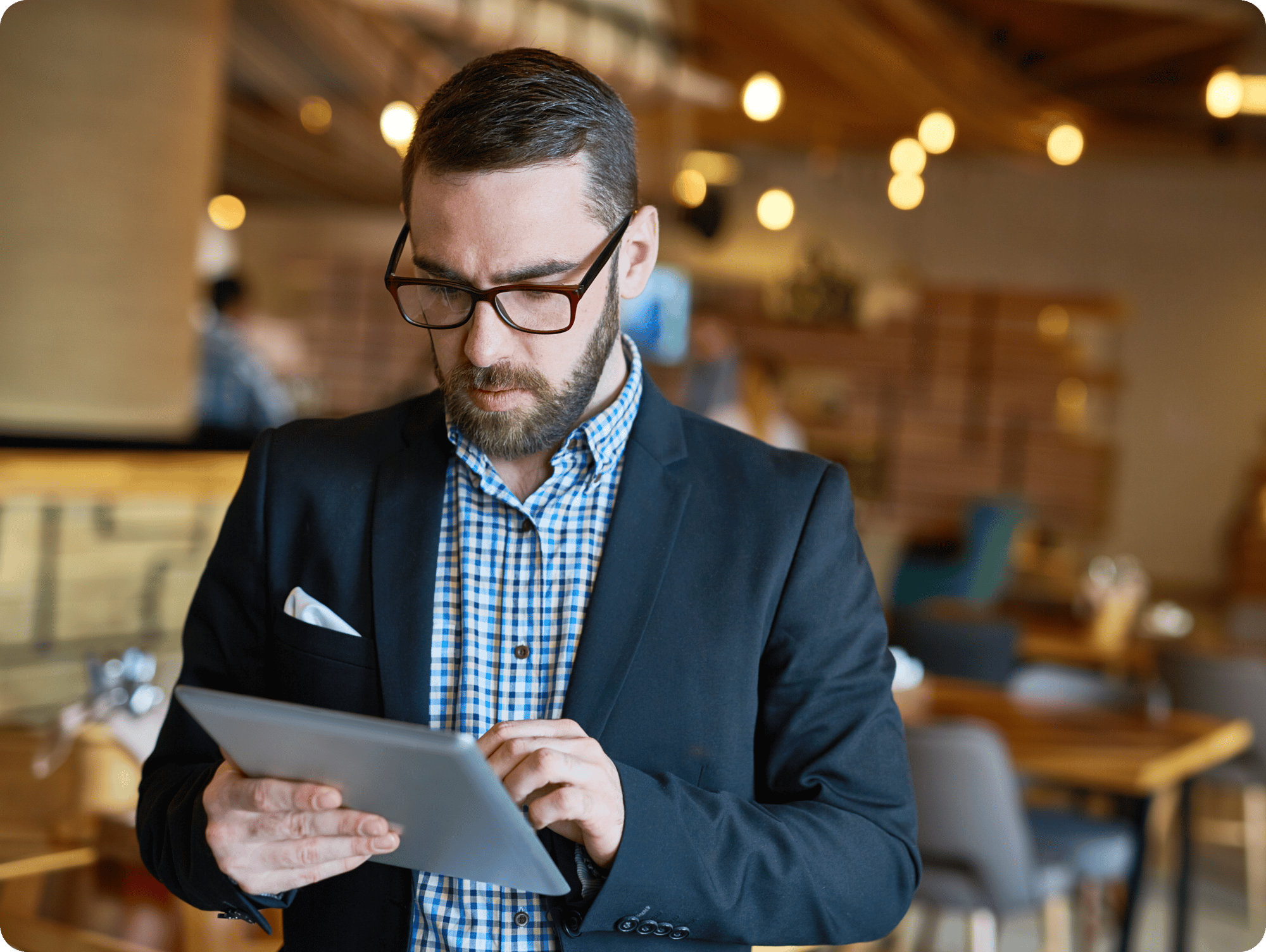 bearded-manager-using-digital-tablet-1